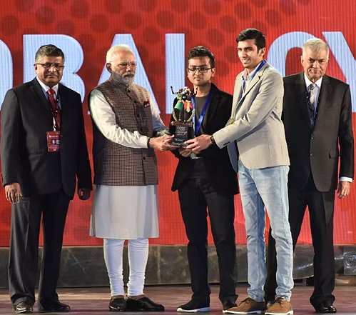 PM Modi felicitates Shikhil Sharma and Ananda Krishna from Astra Security at the Global Conference on Cyberspace GCCS 2017